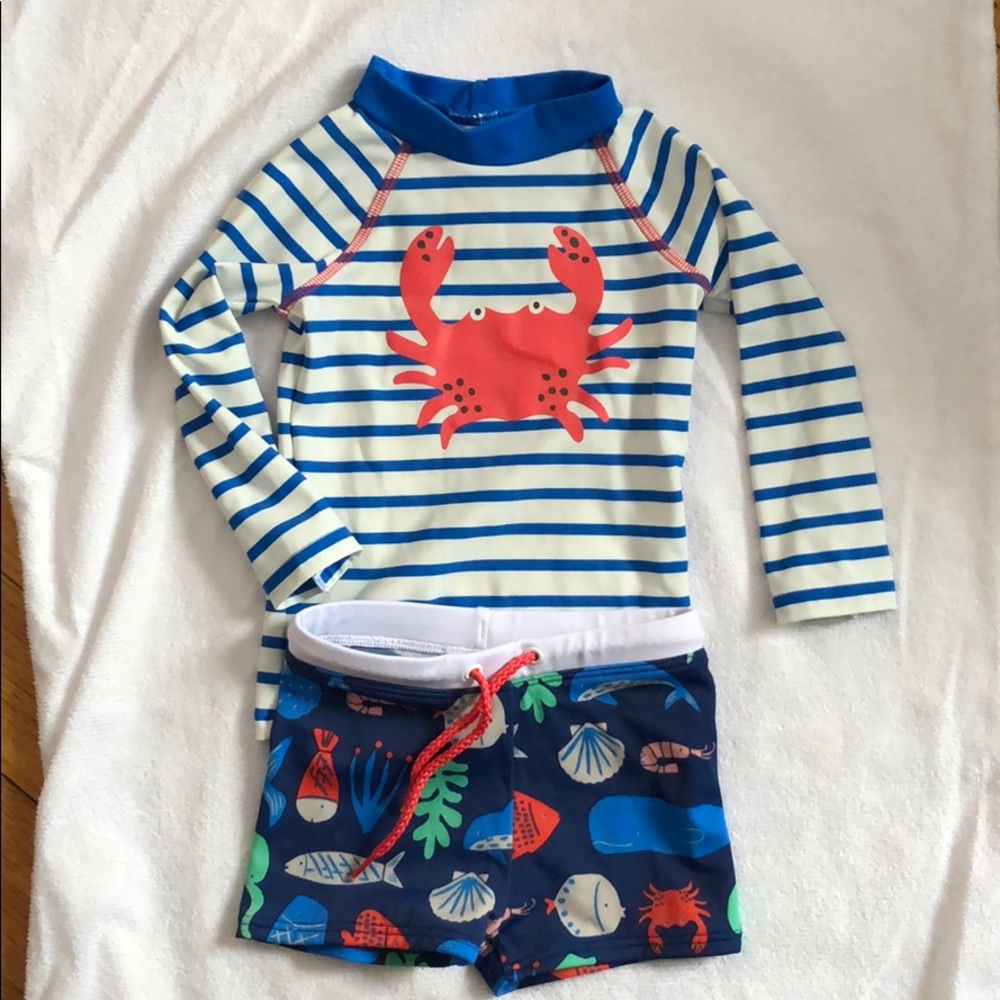 Rash guard and swim shorts.